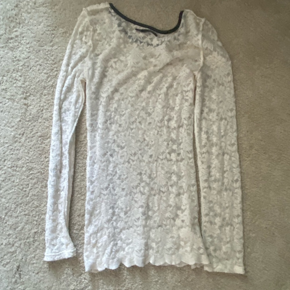 Cream colored lace shirt with leather neckline
